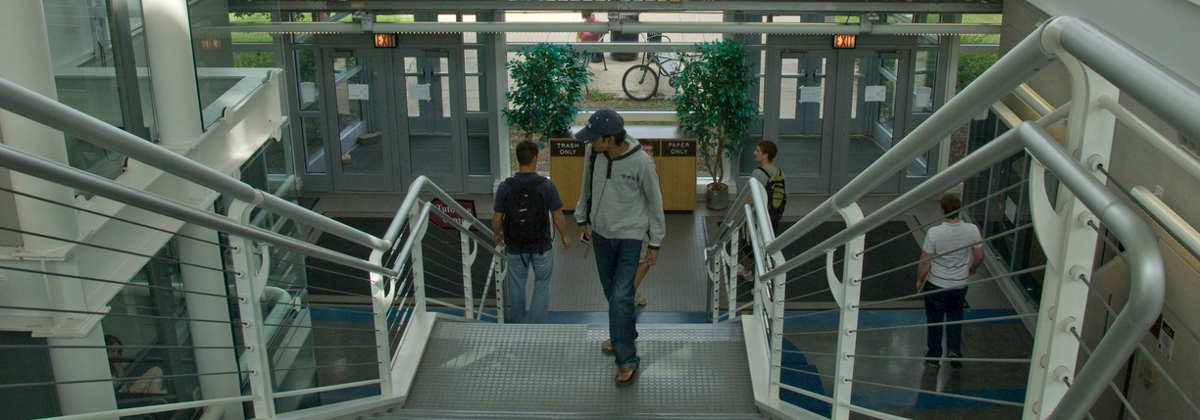 Students walking up the stairs in the Engineering Building